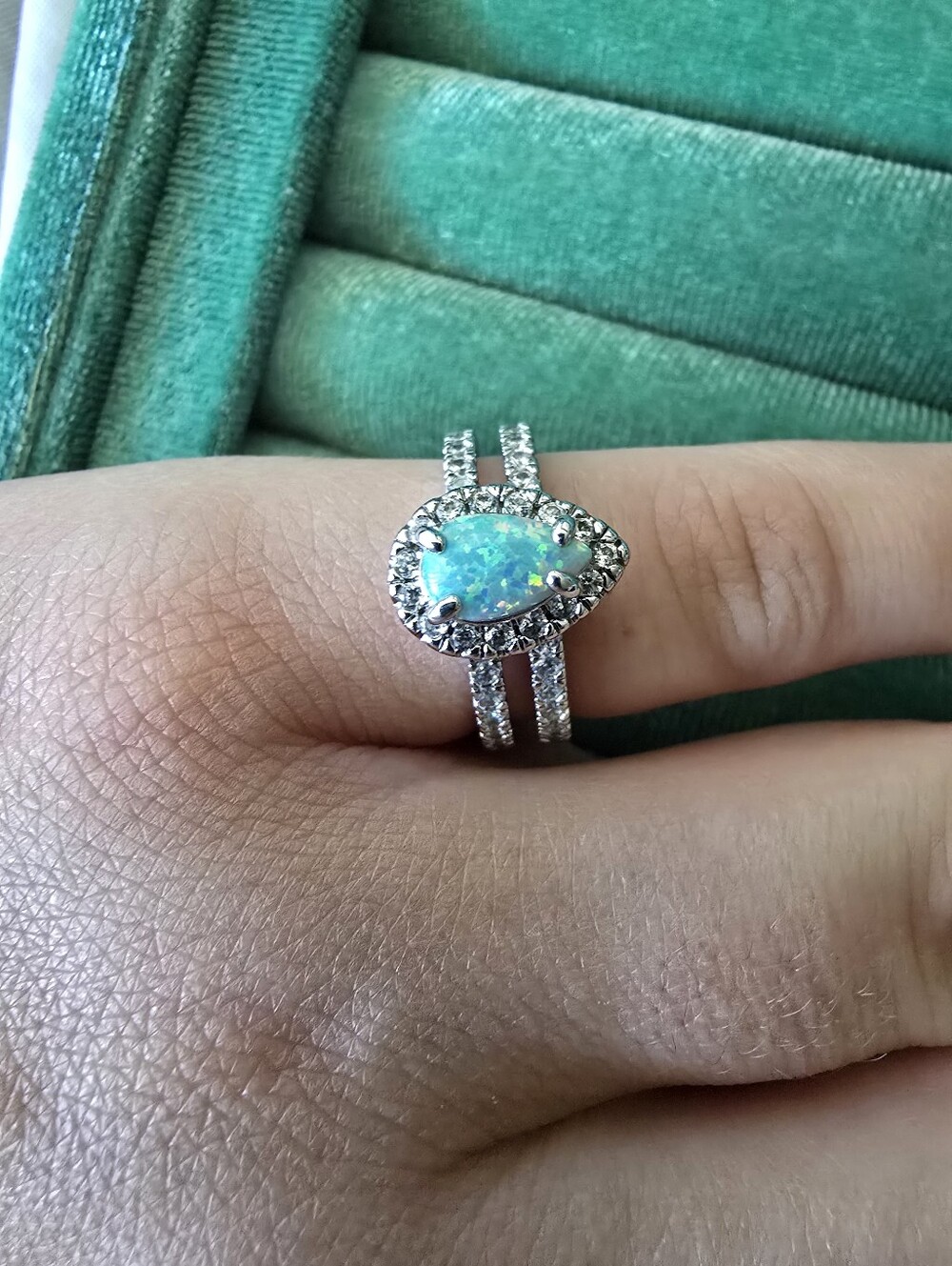Pear-Shaped Blue Opal Halo Ring in Silver